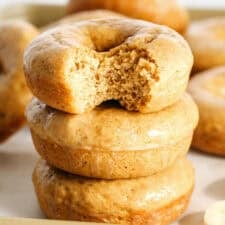 These Baked Banana Bread Donuts are soft, cake-like and made healthier with whole wheat flour, applesauce and zero refined sugar for the perfect morning treat that comes together in just 20 minutes! Such a great way to use up those overripe bananas!
