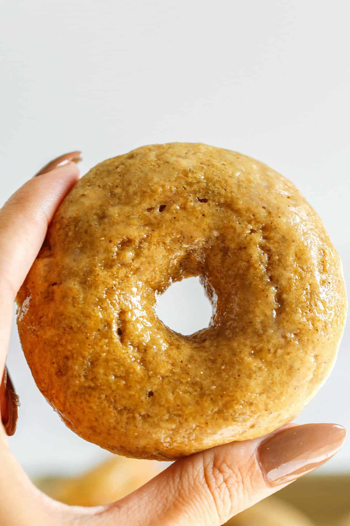 These Baked Banana Bread Donuts are soft, cake-like and made healthier with whole wheat flour, applesauce and zero refined sugar for the perfect morning treat that comes together in just 20 minutes! Such a great way to use up those overripe bananas!