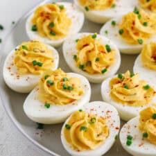 These Healthier Deviled Eggs are a classic recipe that are much lighter in calories thanks to using Greek yogurt! Perfect for parties, Sunday brunch or even a delicious afternoon snack!