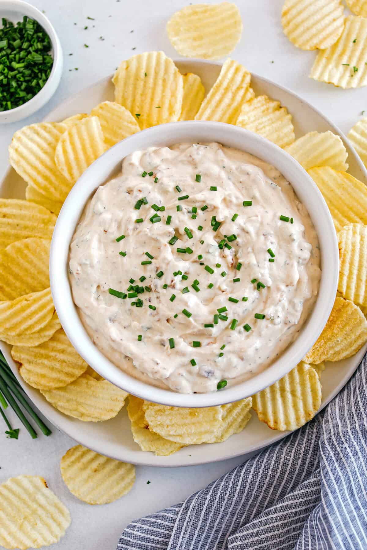 Delicious High Protein French Onion Dip made healthier with protein-packed cottage cheese, caramelized onions, and fresh herbs for the perfect dip to serve with chips, veggies and crackers!